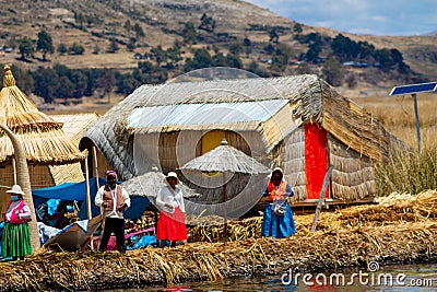 Titikaka lake, tourists visiting Uros islands in Peru Editorial Stock Photo