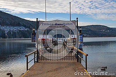 Titisee-Neustadt, Germany - 10 30 2012: Scenic veiw of Titisee Lake on a beautiful cold autumn day Editorial Stock Photo