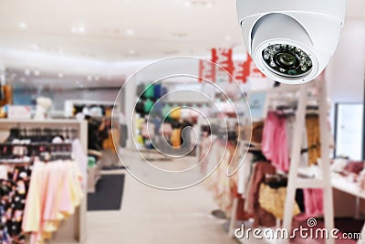 Title: CCTV Security Camera monitoring your place. Stock Photo