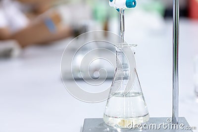 Titration technique in the laboratory. Stock Photo