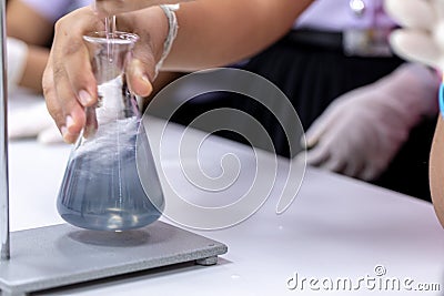 Titration technique in the laboratory. Stock Photo