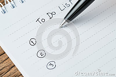 To-do list or writing tasks priority concept, close-up of list o Stock Photo