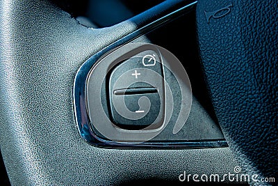To regulate the speed of the cruise control. Cruise control. Speed adjustment. The car drives itself Stock Photo