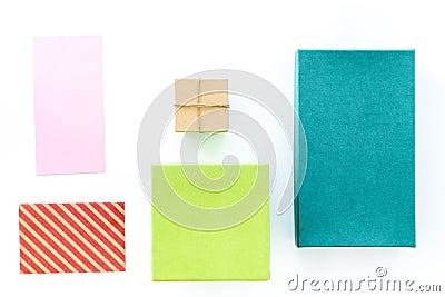 To wrap gift. Box, kraft paper, envelope, greeting card, on white background top view copyspace Stock Photo