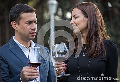 Toast of a couple in the garden of house Stock Photo