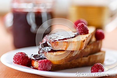 Toast with raspberry jam Stock Photo