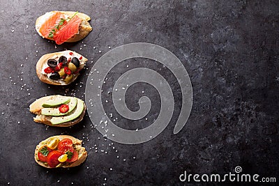 Toast sandwiches with avocado, tomatoes, salmon Stock Photo