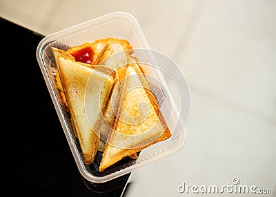 Toasted Bread Photos, in a plastic box. Stock Photo