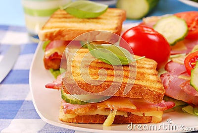 Toasts with cheese,bacon and tomato Stock Photo