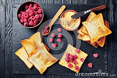 Toasts with sweet peanut butter and berries Stock Photo