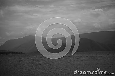 Toba Lake and Mountain View from Pangururan in Samosir Island, Indonesia Stock Photo