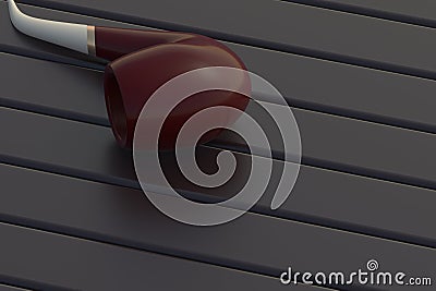 Tobacco pipe on black wooden table Stock Photo