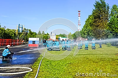 Exercise for fighting fire, hitting the target with a jet of wat Editorial Stock Photo