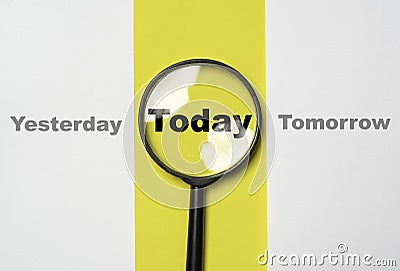 Today wording inside of Magnifier glass on yellow background for focus current situation , positive thinking mindset concept Stock Photo
