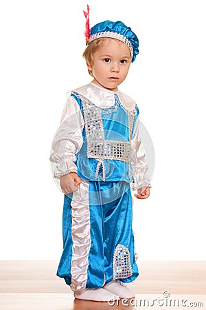 Toddler dressed in a suit of a prince Stock Photo