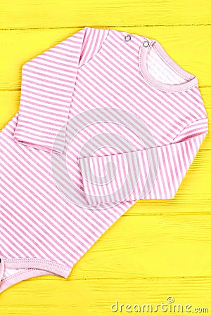 Toddler girl soft striped bodysuit. Stock Photo