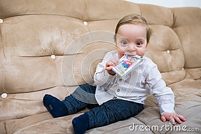 Toddler. Happy child. Smiling blond boy ready to play. Stock Photo