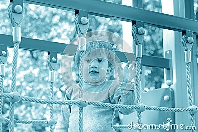 Toddler in playground area Stock Photo