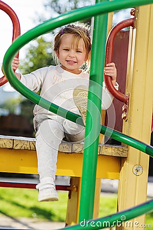 Toddler on the playground Stock Photo