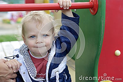 Toddler at playground Stock Photo