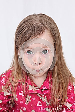 Toddler pulling funny face Stock Photo