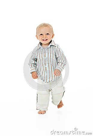 Toddler Walking In Studio Stock Photo