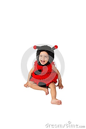 Toddler wearing ladybug costume playing happy smiling fun activity isolated Stock Photo