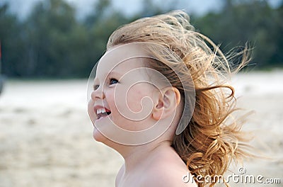 Toddler in the wind Stock Photo