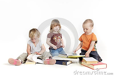 Toddlers reading books Stock Photo