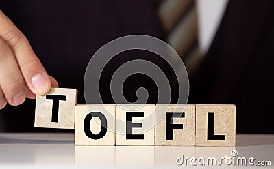 TOEFL - words from wooden blocks with letters Stock Photo