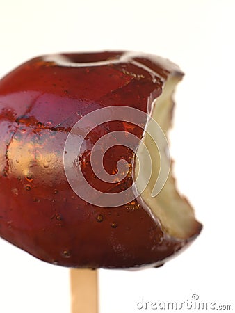 Toffee Apple with a bite taken Stock Photo