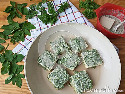 Tofu in green goutweed tempura, cooking organic food Stock Photo