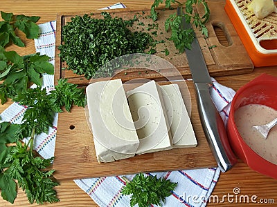 Tofu in green goutweed tempura, cooking organic food Stock Photo