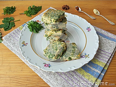 Tofu in green goutweed tempura on plate, cooking organic food Stock Photo