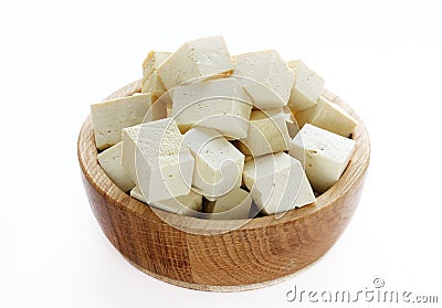 Tofu in a wooden bowl isolated Stock Photo