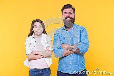 Together we make family. Happy family yellow bacckground. Father and daughter. Bearded man and child. Adoptive family Stock Photo