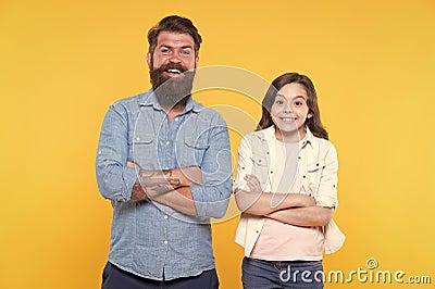 Together we make family. Happy family yellow bacckground. Father and daughter. Bearded man and child. Adoptive family Stock Photo
