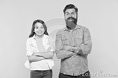 Together we make family. Happy family yellow bacckground. Father and daughter. Bearded man and child. Adoptive family Stock Photo