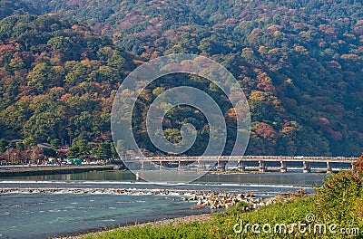 Togetsukyo bridge and Hozu river in autumn season at Arashiyama. Editorial Stock Photo