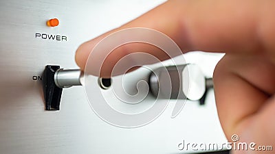 Toggle switch to position on and off. Closeup. Shallow depth of field Stock Photo