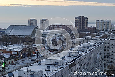 Panoramic view of snow-covered residential buildings and the building of the Olimp sports complex. Editorial Stock Photo