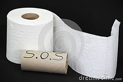 Toilet paper roll on black background Stock Photo