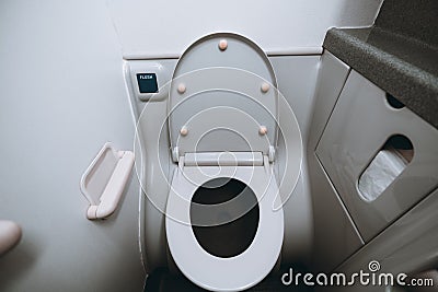 Toilet room on an airplane, w.c. pan Stock Photo