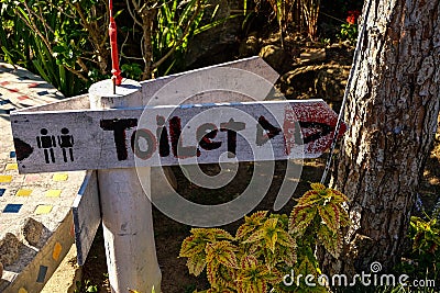 Toilet sign to show the way restroom is there Stock Photo