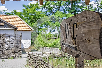 Toilet wooden sign pointer in vintage style Stock Photo