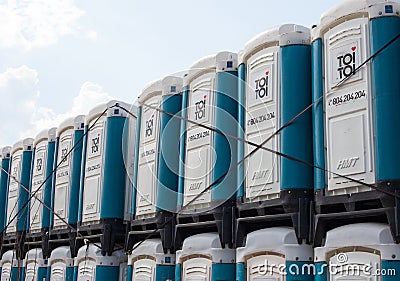 Toilette cabins outside, row portable blue Toilets. Editorial Stock Photo