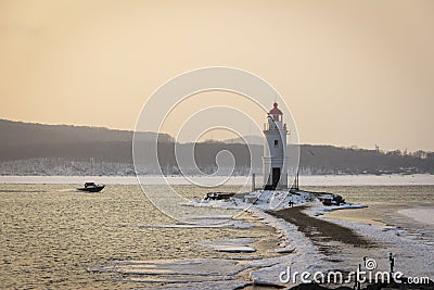 Tokarevsky lighthouse in Vladivostok at dawn on a winter Stock Photo