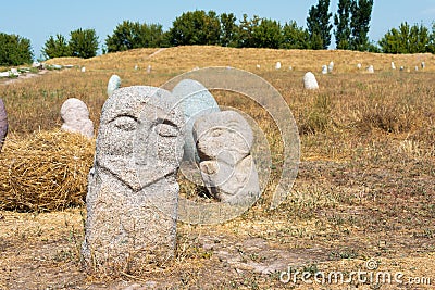 Kurgan stelae at Ruins of Balasagun in Tokmok, Kyrgyzstan. Balasagun is part of the World Heritage Stock Photo