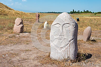 Kurgan stelae at Ruins of Balasagun in Tokmok, Kyrgyzstan. Balasagun is part of the World Heritage Stock Photo