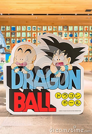 Lifesize standee in a Japanese Uniqlo store featuring Dragon Ball manga heroes Son Goku and Krillin. Editorial Stock Photo